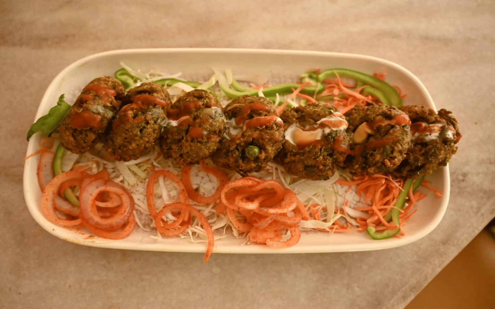 Chulha-cooked food plated for service at Signum Resort, Bandhavgarh