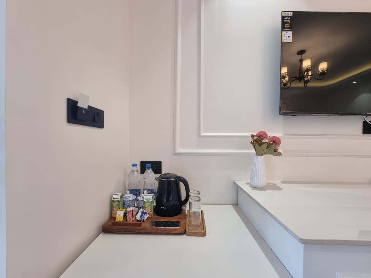 Tea-coffee maker and 55-inch Smart TV amenities in the Premium Room