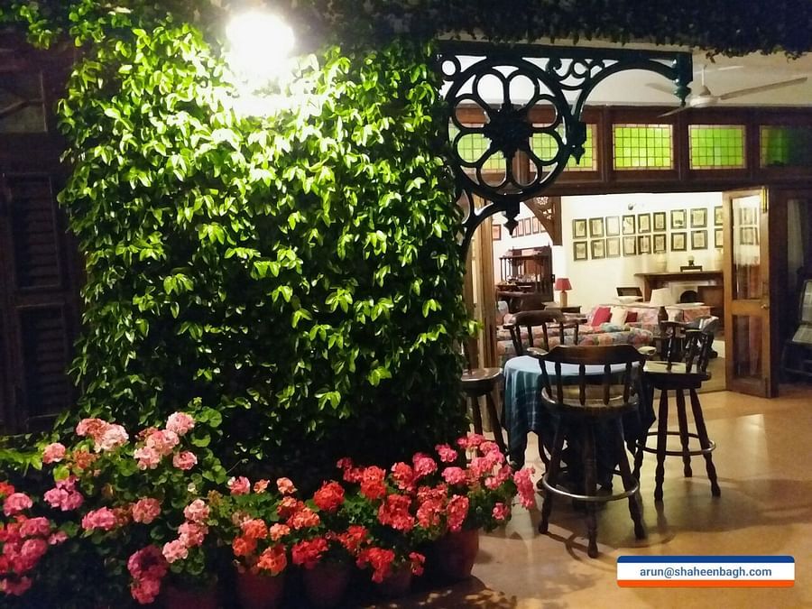 Vintage sit out area with a colorful decor in the evening.