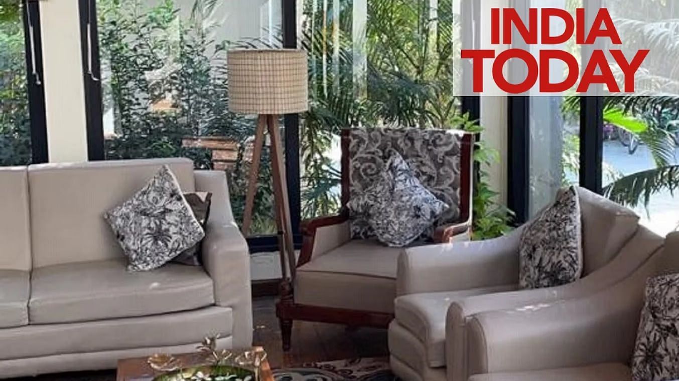 A common seating area with a small coffee table in front of it - Ivory Destinations