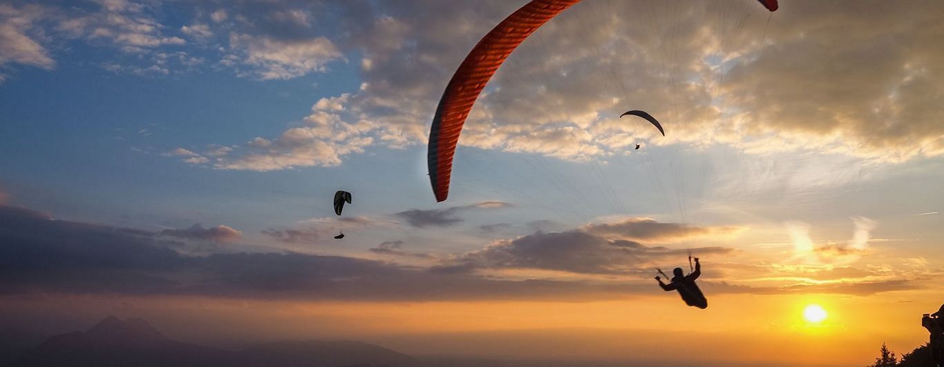paragliding during sunset