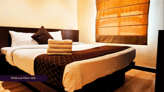 Deluxe Non Ac Room with beautiful ambience and cosy bed