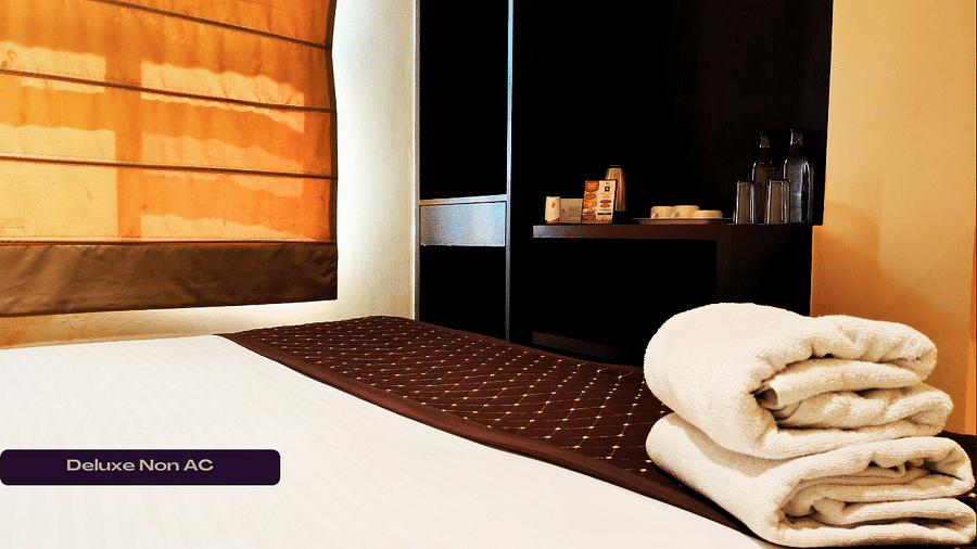 Deluxe Non Ac Room with beautiful ambience and cosy bed