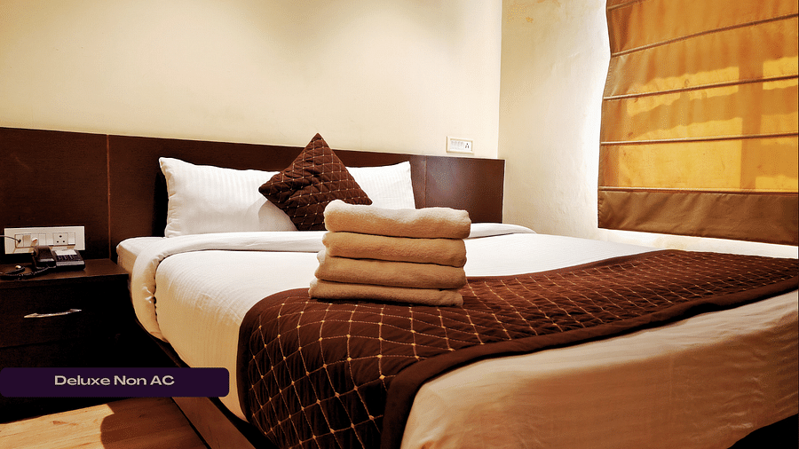 Deluxe Non Ac Room with beautiful ambience and cosy bed