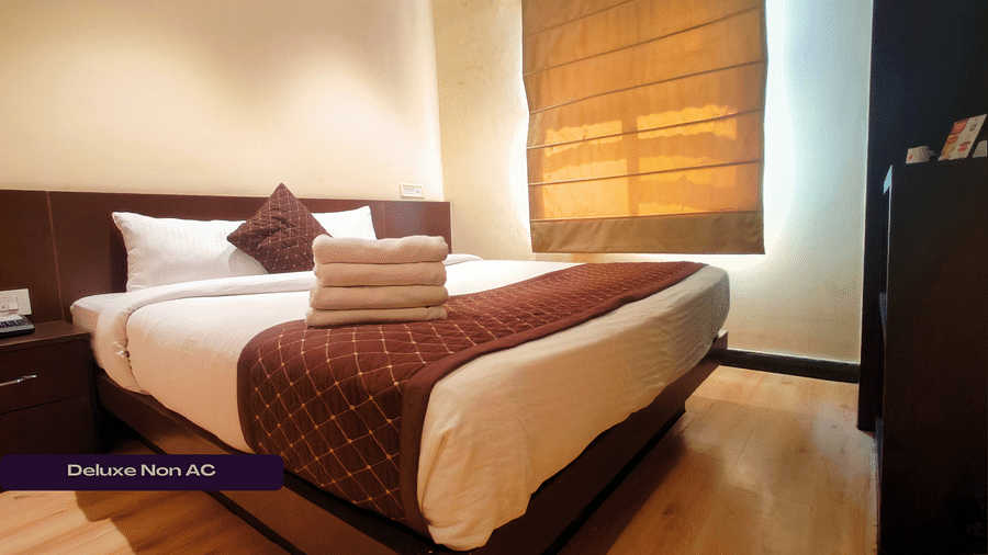 Deluxe Non Ac Room with beautiful ambience and cosy bed