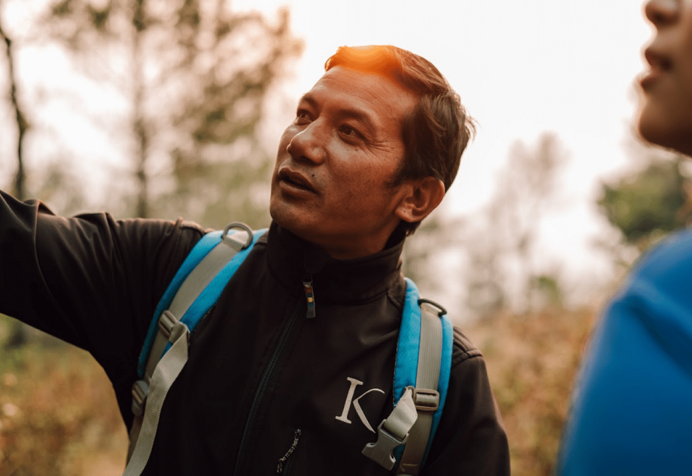 A picture of two people discussing something while they are on a hide | Kavya Resort and Spa, Nagarkot
