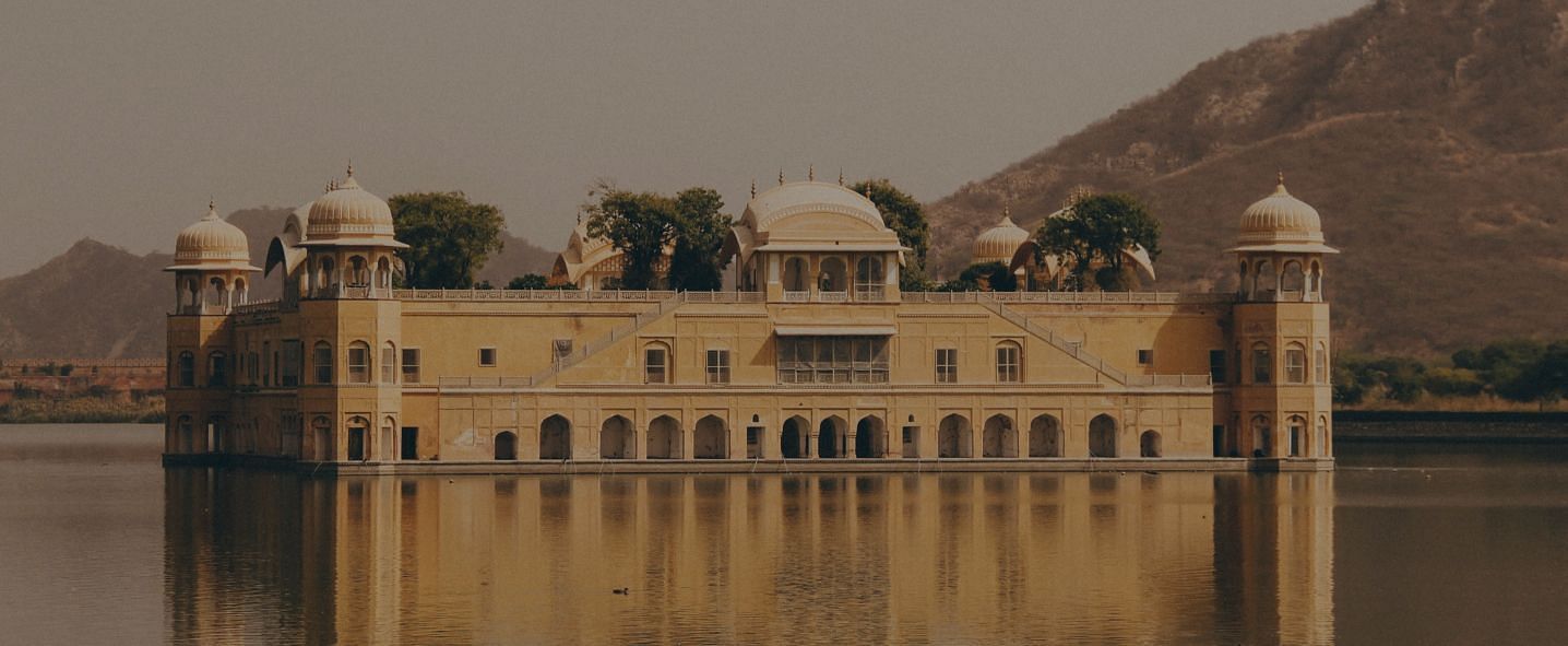 An image of a palace located in a water body