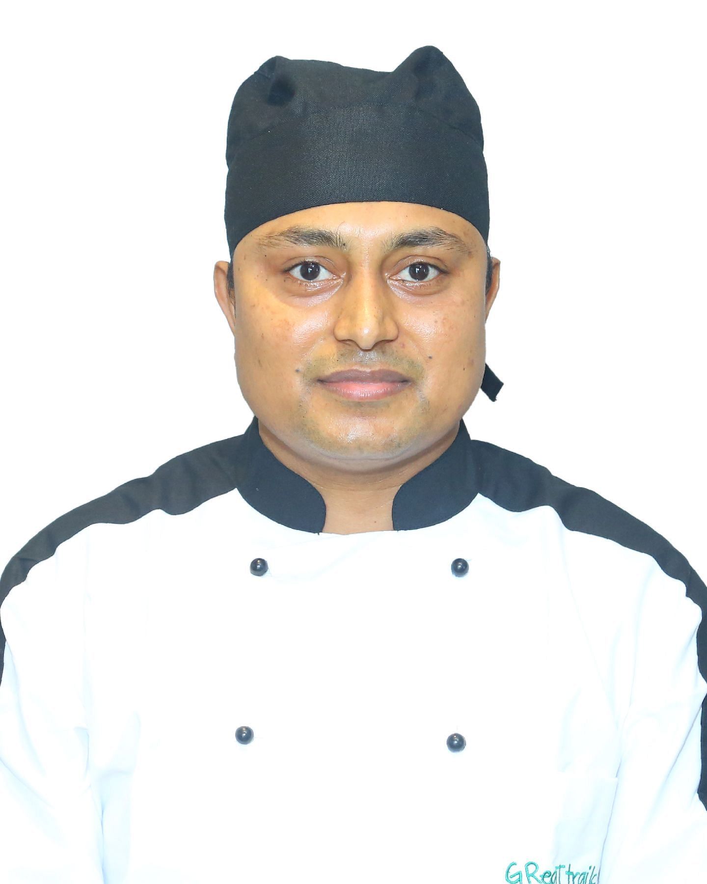 A close up shot of a staff member of Great Trails Yercaucd by GRT hotels.