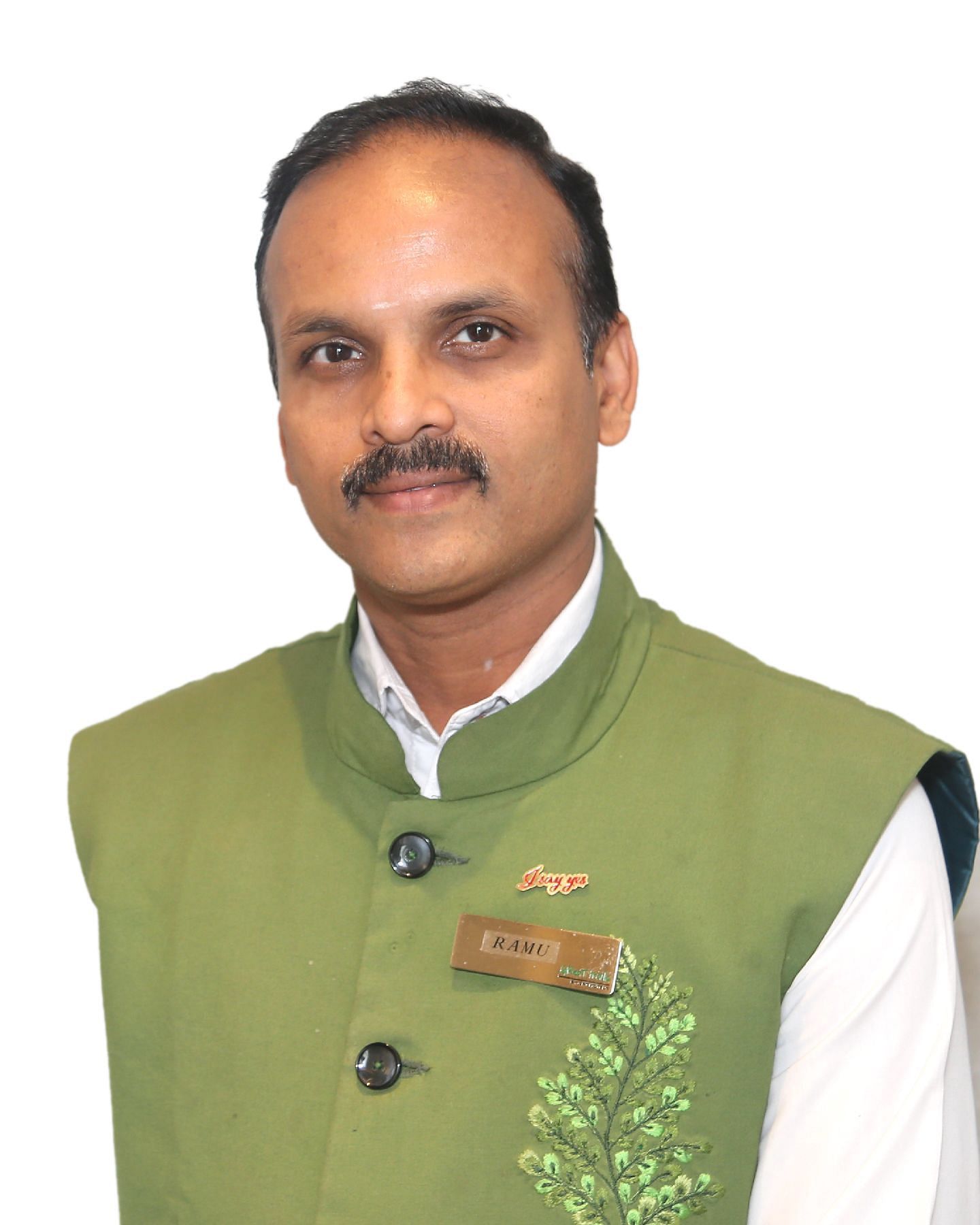 A close up shot of a staff member of Great Trails Yercaucd by GRT hotels.
