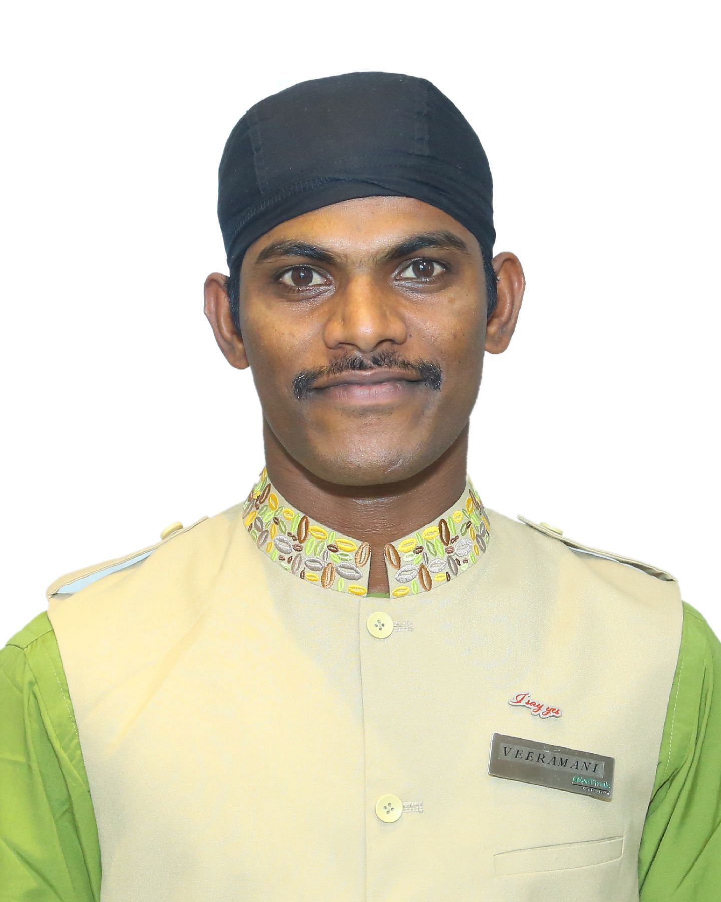 A close up shot of a staff member of Great Trails Yercaucd by GRT hotels.