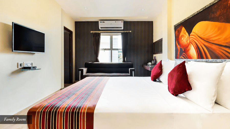 Family Room with television at Mount Embassy Hotel