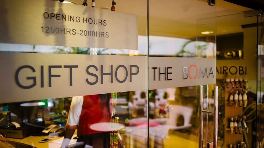 glass door labeled Gift Shop showing interior display at The Boma Nairobi.