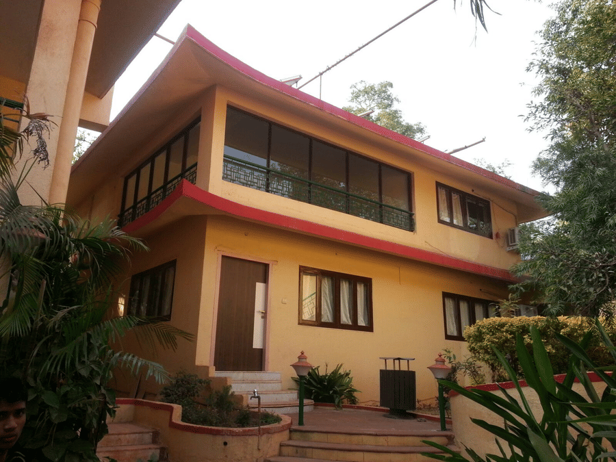 An exterior view of the two floor bungalow of the resort, of of their accommodation options.