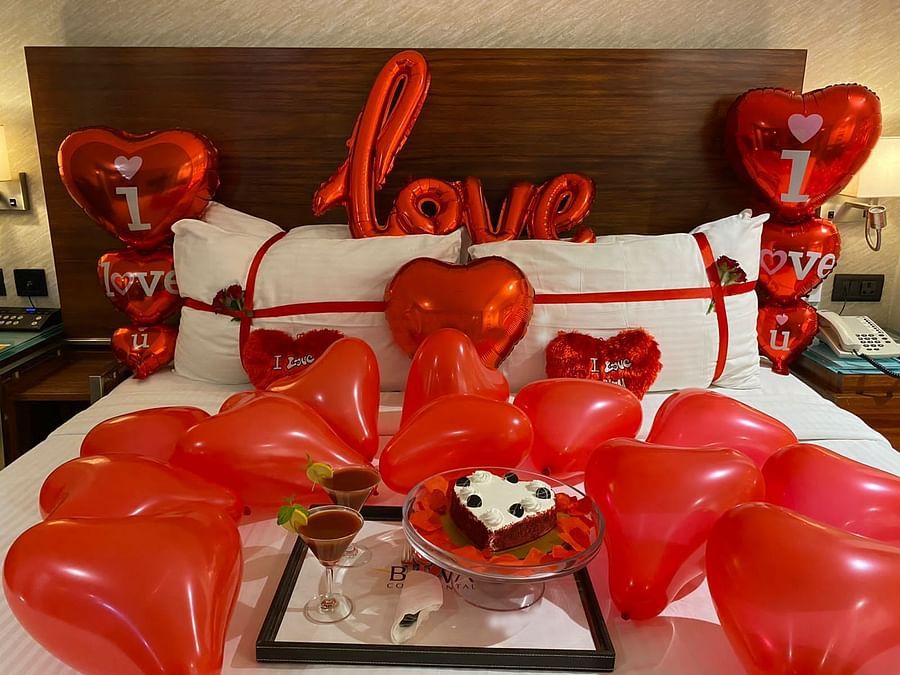 Bed with heart shaped balloons - Bawa Group of Hotels
