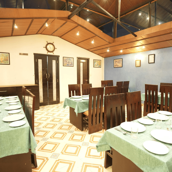 Sets of Chairs and table inside a restaurant in an ordered fashion