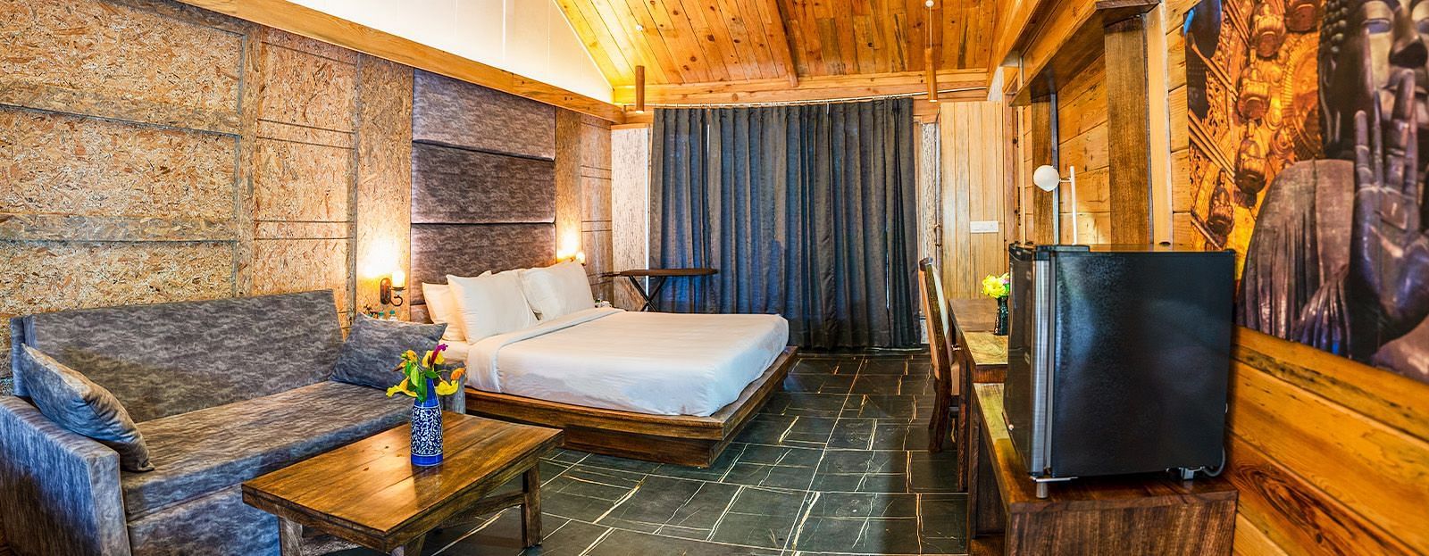 A view of a large bed in a room at The Sylvan Retreat, Dehradun.