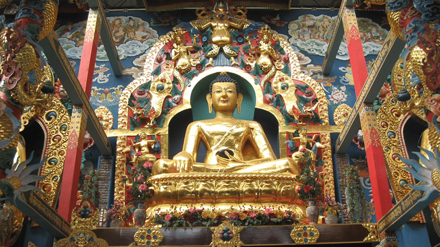Golden Buddha statue in the Namdroling Monastery, the Golden Temple at Bylakuppe, on the Bangalore to Coorg route