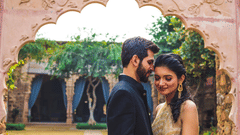 Pre Wedding shoot with a man and a woman standing close to each other 
