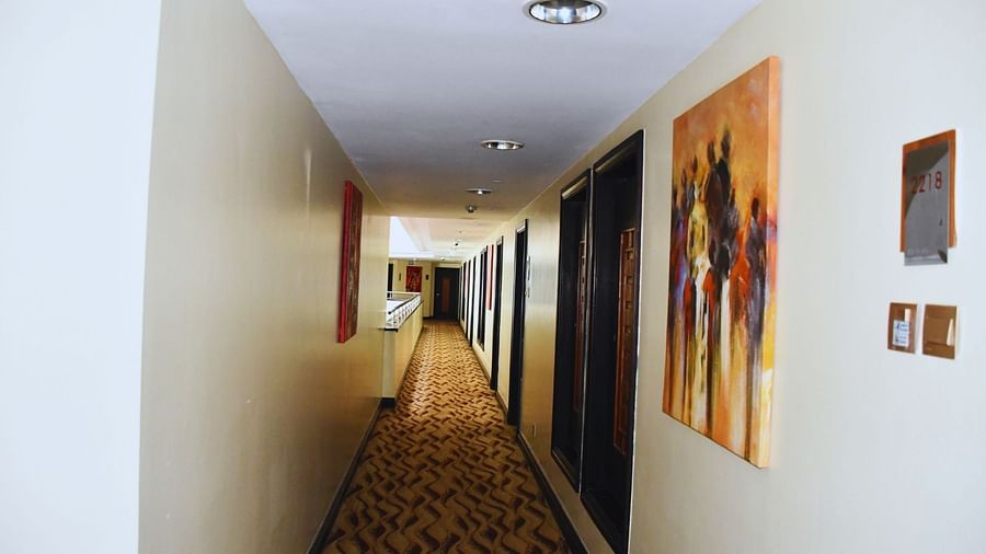 A corridor at The Boma Nairobi with wall decors.