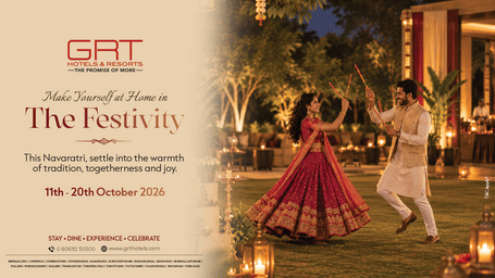 Grt hotels navratri poster 'the festivity' — couple in red lehenga and cream kurta playing dandiya on lantern-lit lawn, stay dates 11th-20th october 2026, grt logo.