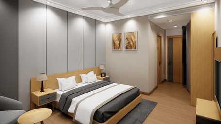 Minimal modern bedroom with neutral tones, upholstered wall panels, wooden accents, and soft ambient lighting.