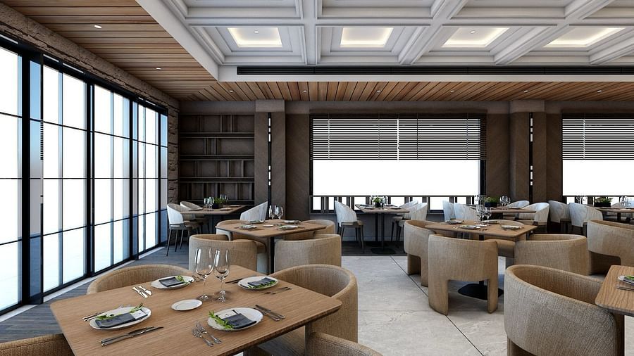 Dining tables placed besides the huge windows emitting plenty of natural light from outside - Namaste Corbett 