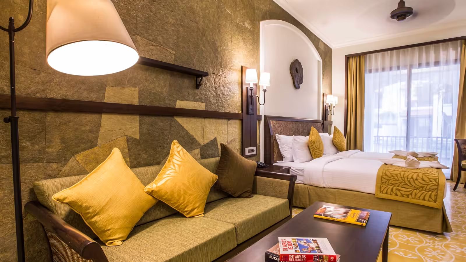 an image of the seating area next to the bed - Rhythm Lonavala