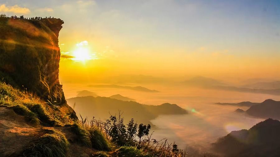 aerial-photo-of-mountain-surrounded-by-fog-733174 gxv6ws
