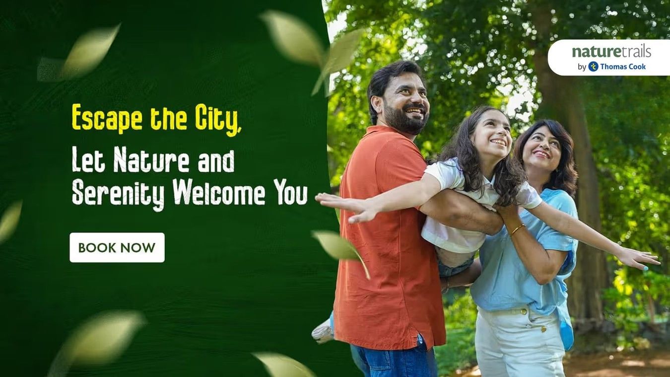 Promotional banner of Escape The Nature featuring husband, wife, and their daughter amidst nature. The promotion is encouraging people to escape the city and let nature serenity welcome you at Nature Trails Resort.