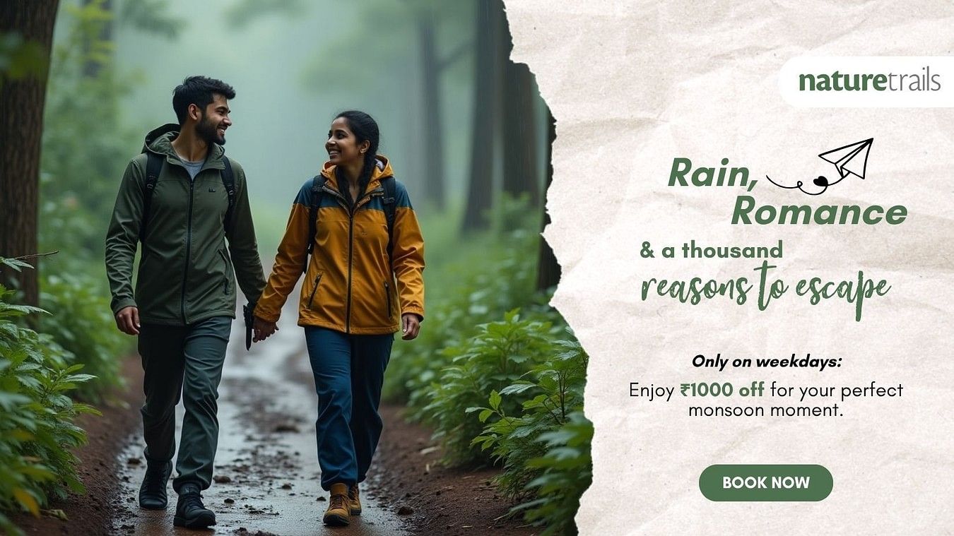 Couple walking hand-in-hand through a lush green forest trail during monsoon, promoting a Nature Trails weekday offer with ?1000 discount.