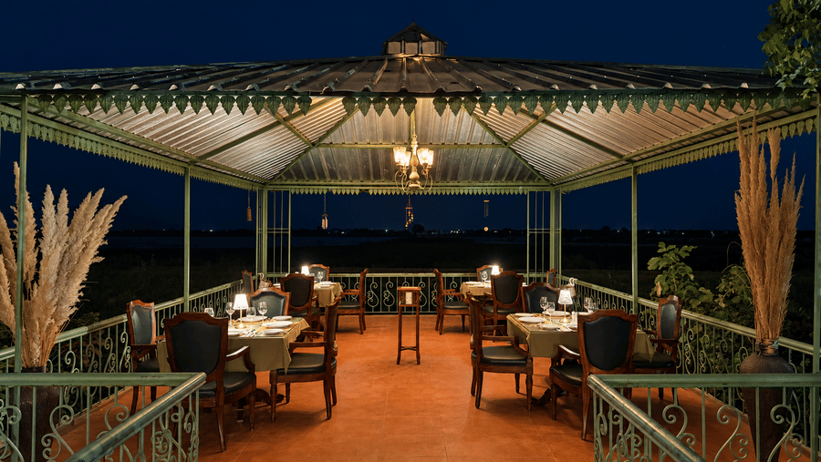 Dining-Upper Deck-Warm Lights in a Nighttime Pavilion