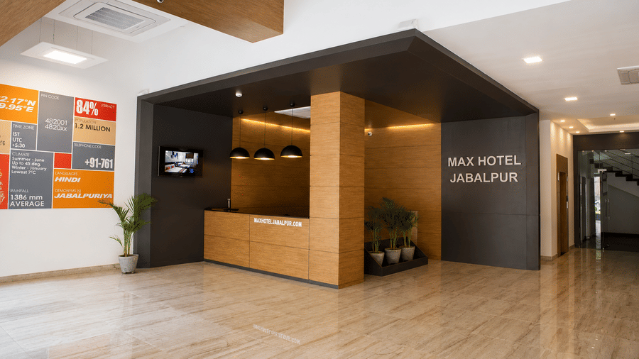 Contemporary reception area with stylish decor at Max Hotel Jabalpur.