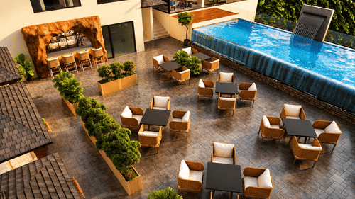 Poolside open-seating restaurant at Pride Plaza Indore featuring multiple neatly arranged dining tables.