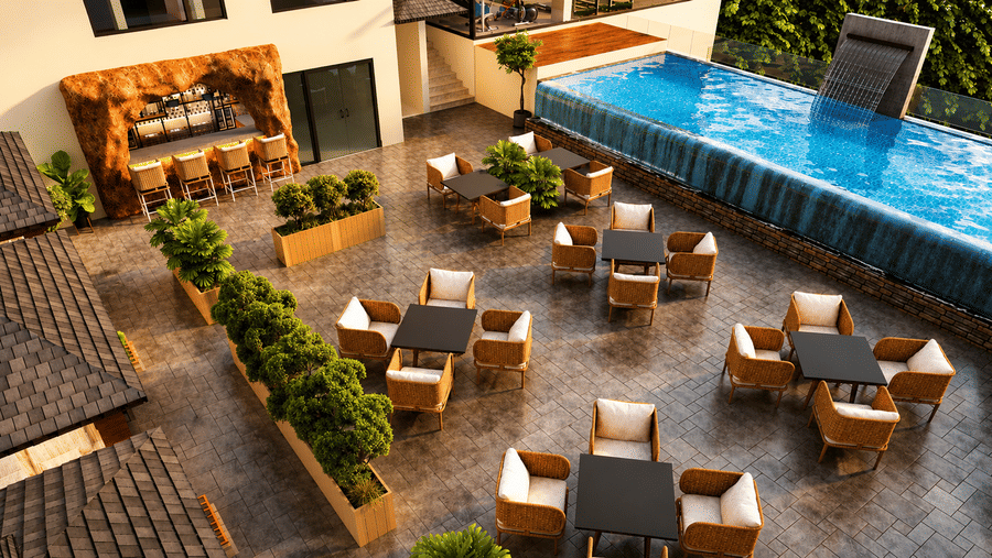 Poolside open-seating restaurant at Pride Plaza Indore featuring multiple neatly arranged dining tables.