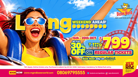 MGM Dizzee World long weekend offer showing a woman with sunglasses laughing on a roller coaster, with 30% off regular tickets at INR 799 till 20 October
