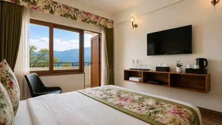 Guest room at Valmere Himalayan Hotel & Spa, Gangtok with a floral curtain valance, an open door to a mountain-view balcony, and a black leather accent chair.