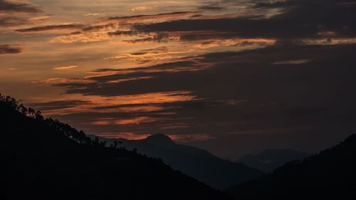 Scenic view of the Kumaon hills captured during sunset - Ramgarh Bungalows, Nainital.