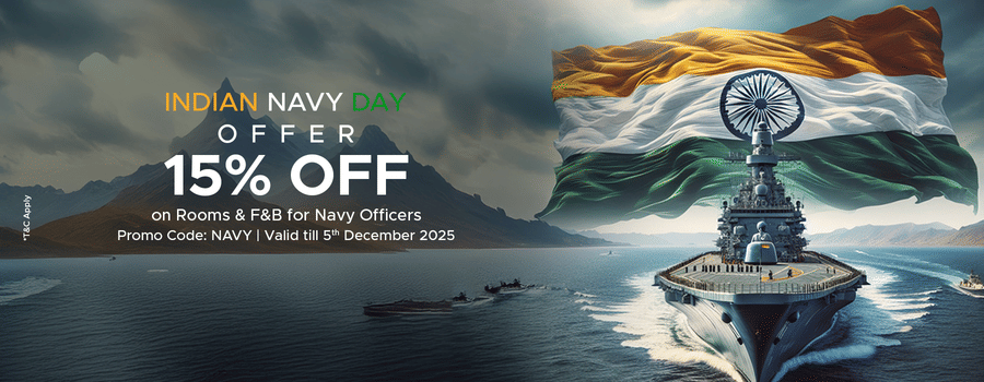 An Indian Navy Day offer banner showing naval ships at sea, a large national flag waving, and a 15% discount announcement for navy officers.