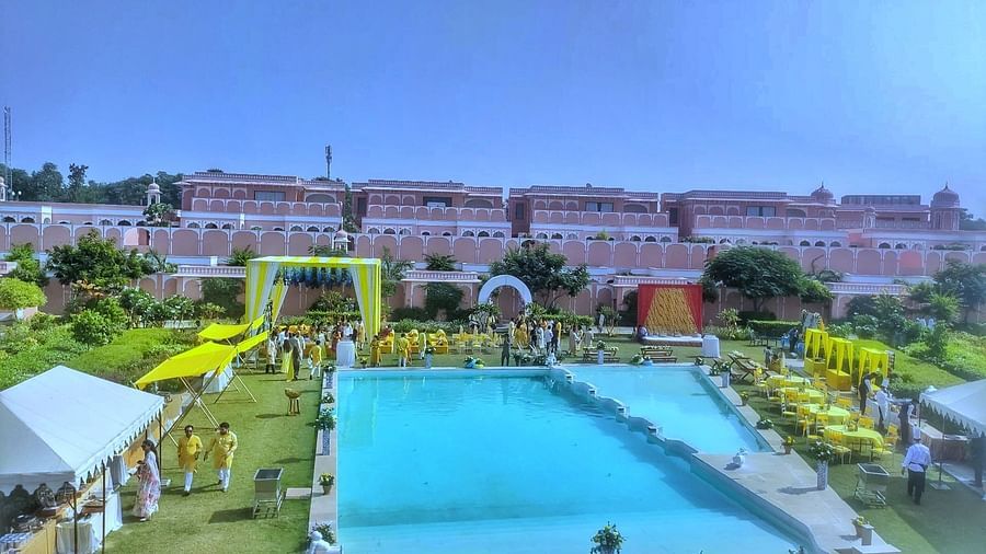 the outside lawn surrounding the swimming pool decorated for a party - Buena Vista