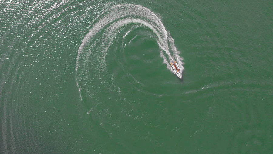 Aerial view of a boat on a waterbody.