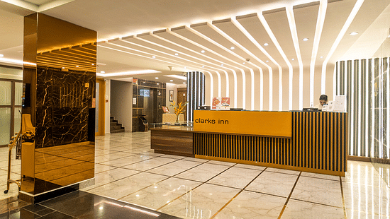 Image featuring a reception desk under warm lighting