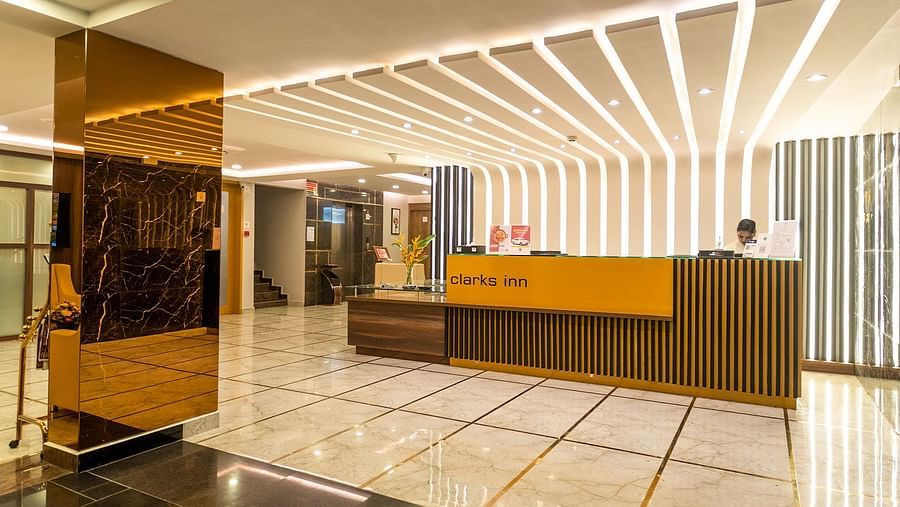 Image featuring a reception desk under warm lighting