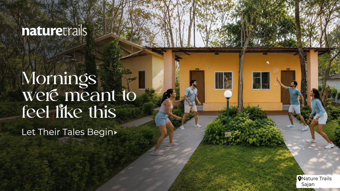 Guests enjoying a peaceful morning outside a yellow heritage cottage at NatureTrails