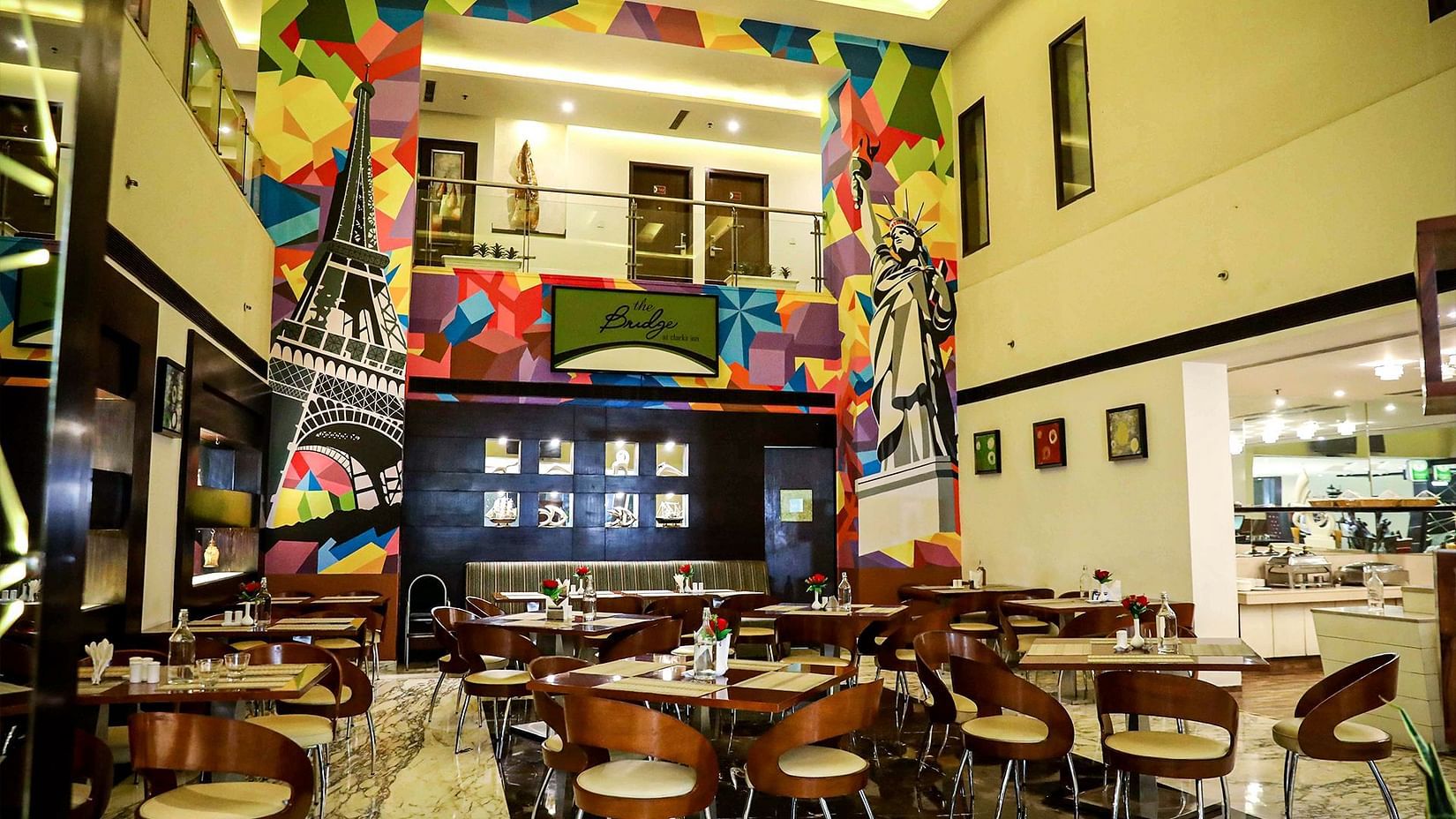 Restaurant featuring chairs and tables arranged in thedining space