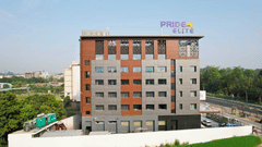 facade image of Pride Elite, Haridwar during the day
