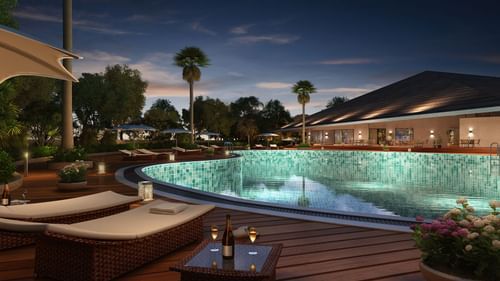 A large swimming pool with loungers on the side - Ananta Spa and Resort, Ajabgarh