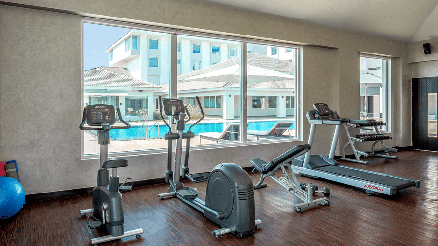 an image of a well-equipped gym at The Residency Towers Rameswaram