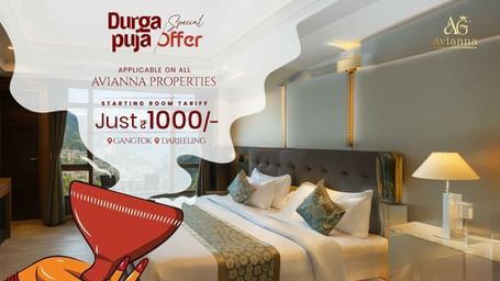 Festive Durga Puja offer with a cosy hotel room and cocktail glass – stays starting from ?1000 at 6S Alumbra Hotels, limited time only.