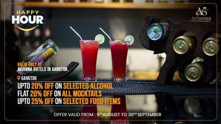 Elegant bar setup with cocktails promoting 6S Alumbra’s Happy Hour – up to 20% off on selected drinks and bar bites during stay.