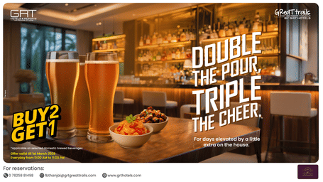 Promotional banner featuring beer with snacks, highlighting a buy two get one free deal .